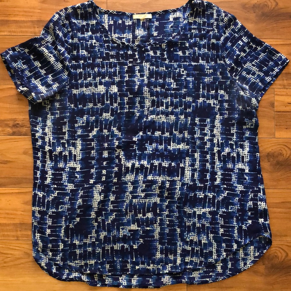 Woman’s blue and white blouse. Size Large